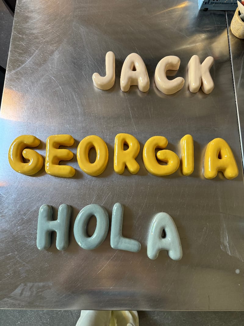 Ceramic clay letters spelling &