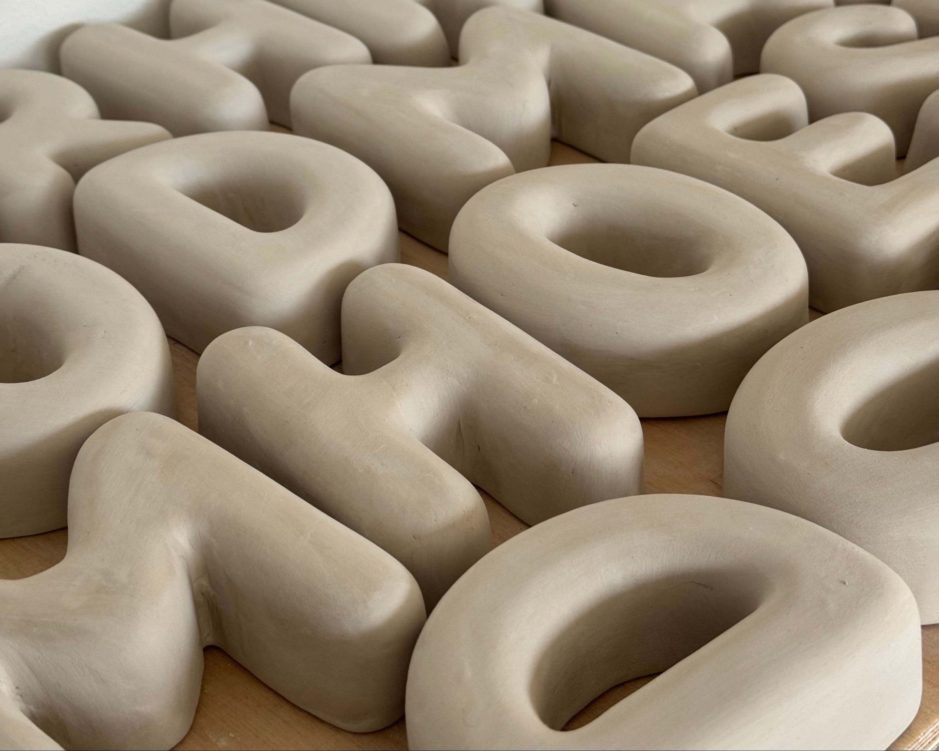 Letter X – Unglazed ceramic decor