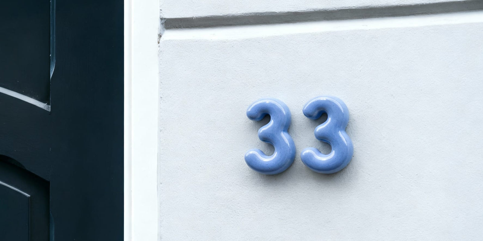 Ceramic letters mounted on a wall