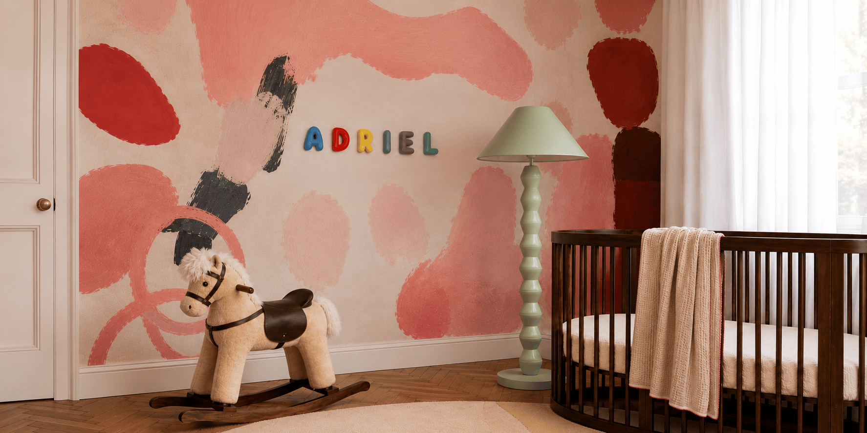 Nursery room with crib, rocking horse, and colorful wall art from ceramic letters.